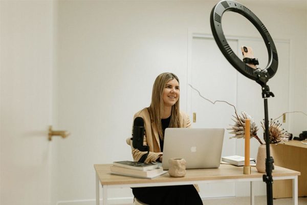 Golden Brands Founder Lisa Macale sitting at desk
